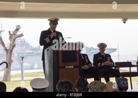 WHITE BEACH, Okinawa - (Feb. 8, 2018) - Capt. Scott Hardy gives remarks during a change of command ceremony at White Beach Naval Facility in Uruma City, Okinawa, Japan, Feb 8. Capt. Hardy relieved Capt. Robert Mathewson as the commanding officer of Commander, Fleet Activities Okinawa. Fleet Activities Okinawa supports the full spectrum of Navy operations on Okinawa, and its major tenant commands are Commander Task Force 76, Naval Mobile Construction Battalion 3 and Patrol and Reconnaissance Force 7th Fleet. Stock Photo