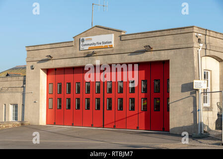 Bude, Cornwall, England UK. February 2019. The Community fire station with red sliding doors Stock Photo