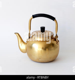Beautiful golden vintage kettle isolated on white background Stock Photo