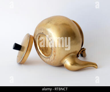 Beautiful golden vintage kettle isolated on white background Stock Photo