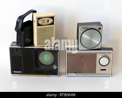 Old collectible radio transistors. Different models photographed on white background Stock Photo