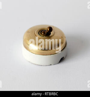 Vintage porcelain and brass switch Stock Photo