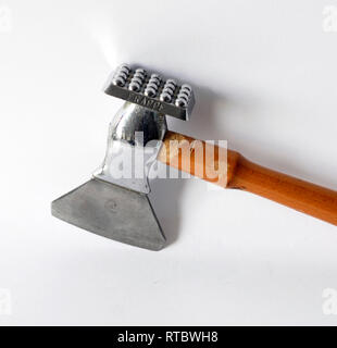Vintage tenderizer for meat, wood and metal Stock Photo