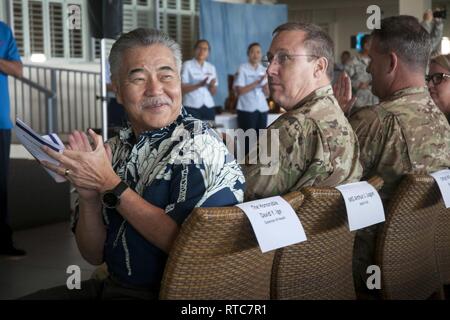 David Ige, Hawaii State Governor, applauds members of the Hawaii Air National Guard Feb. 10, 2019, at Joint Base Pearl Harbor-Hickam during the 2018 Launa’ole Awards ceremony. The ceremony has been held for 43 years and was officially renamed to Launa’ole in 2001, meaning “beyond comparison” or “without peer.” Stock Photo