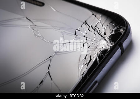 Modern Gadgets: Broken Phone Glass Stock Photo