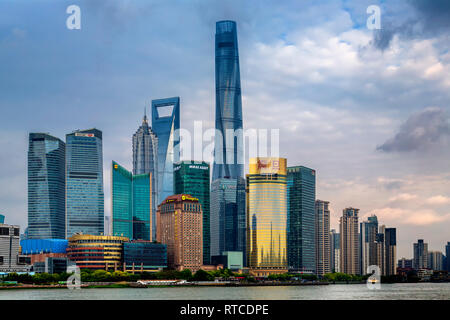 The skyscrapers of New Pudong in Shanghai provide an eye catching Cityscape. Viewed from The Bund looking across the Huang Pu River. Shanghai, China. Stock Photo