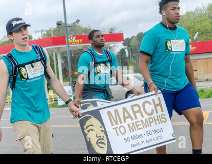 A group of young people marches down Highway 61, April 3, 2018, in Memphis, Tennessee. Stock Photo
