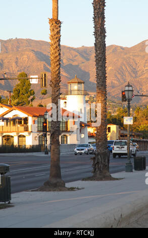 View across E Cabrillo Blvd to the lighthouse building (Bluewater Grill restaurant) and distant Santa Ynez Montains, Santa Barbara, California, USA Stock Photo