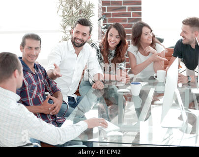 Creative workers design together in the Studio. Stock Photo
