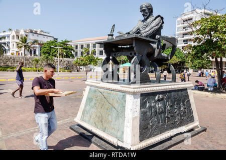 Cartagena Colombia,Hispanic resident residents,Plaza Cervantes,statue,sculpture,Miguel de Cervantes Saavedra by Hector Lombana,man men male,COL1901190 Stock Photo