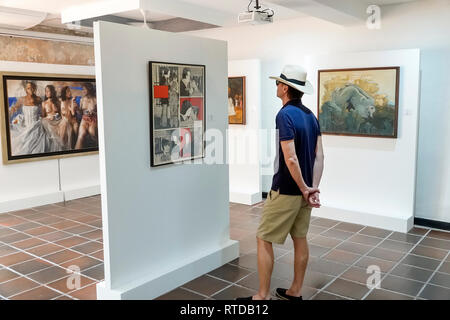 Cartagena Colombia,Museo de Arte Moderno,modern art artwork museum gallery galleries,exhibit,inside interior,paintings,sculpture,adult adults man men Stock Photo