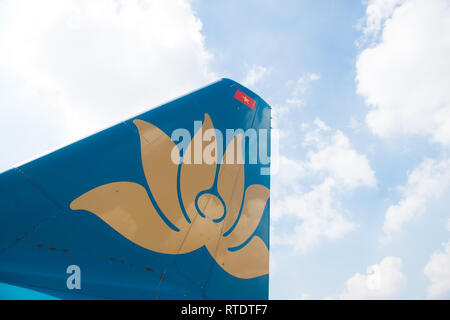 Ho Chi Minh City, Vietnam- June 27, 2018:  - Aircraft tail on the background of blue sky. Vietnam airline at Tan Son Nhat Airport in Ho Chi Minh City  Stock Photo