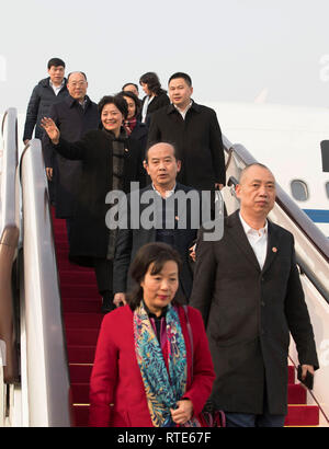 (190301) -- BEIJING, March 1, 2019 (Xinhua) -- Members of the 13th National Committee of the Chinese People's Political Consultative Conference (CPPCC) from southwest China's Sichuan Province arrive in Beijing, capital of China, on March 1, 2019, for the second session of the 13th CPPCC National Committee.  (Xinhua/Wang Ye) Stock Photo