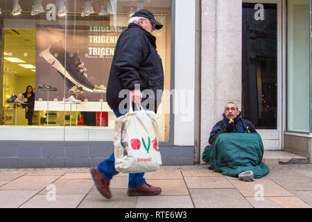 Preston, Lancashire. 1st March 2019. UK Weather. John, suffering from depression ended up on the streets after the loss of his wife. Cold, damp inclement day in the town centre as Preston’s homeless people hope for donations on the city centre streets. Trapped in the social system by having no fixed abode, they are unable to claim Universal Credit and resort to begging to hopefully acquire cash from passing shoppers, enough for a overnight hostel. Credit. MWI/AlamyLiveNews. Stock Photo