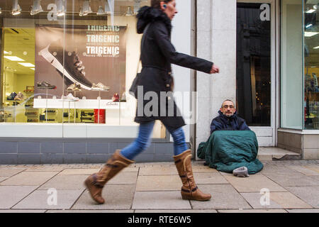 Preston, Lancashire. 1st March 2019. UK Weather. John, suffering from depression ended up on the streets after the loss of his wife. Cold, damp inclement day in the town centre as Preston’s homeless people hope for donations on the city centre streets. Trapped in the social system by having no fixed abode, they are unable to claim Universal Credit and resort to begging to hopefully acquire cash from passing shoppers, enough for a overnight hostel. Credit. MWI/AlamyLiveNews. Stock Photo