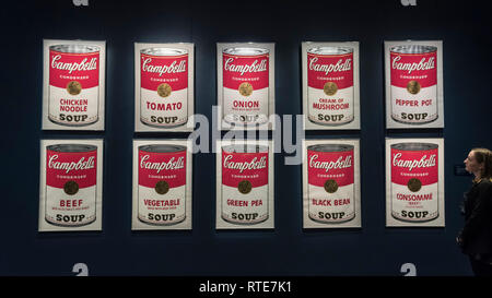 London, UK.  1 March 2019. A staff member walks by ''Campbell's Soup I'', 1968, by Andy Warhol, (Est. £300,000 - 400,000).  Preview of Sotheby's Contemporary Art Sale in their New Bond Street galleries.  Works by artists including Tracey Emin, Jenny Saville, Jean-Michel Basquiat and Andy Warhol will be offered for auction on 5 March 2019.   Credit: Stephen Chung / Alamy Live News Stock Photo