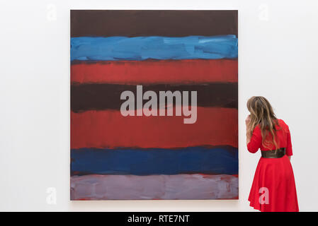 London, UK.  1 March 2019. A visitor views 'Landline Red Blue', 2015, by Sean Scully, (Est. £700,000 - 1,000,000).  Preview of Sotheby's Contemporary Art Sale in their New Bond Street galleries.  Works by artists including Tracey Emin, Jenny Saville, Jean-Michel Basquiat and Andy Warhol will be offered for auction on 5 March 2019.   Credit: Stephen Chung / Alamy Live News Stock Photo
