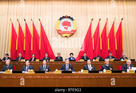 (190301) -- BEIJING, March 1, 2019 (Xinhua) -- Wang Yang (C, front), chairman of the Chinese People's Political Consultative Conference (CPPCC) National Committee, presides over the closing meeting of the fifth session of the Standing Committee of the 13th CPPCC National Committee in Beijing, capital of China, March 1, 2019. (Xinhua/Huang Jingwen) Stock Photo
