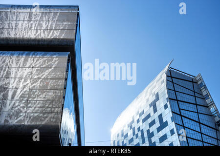 Johannesburg, South Africa, 30 November - 2018: Steel and glass clad buildings in city centre. Detail of steel clad building with tree pattern on clad Stock Photo