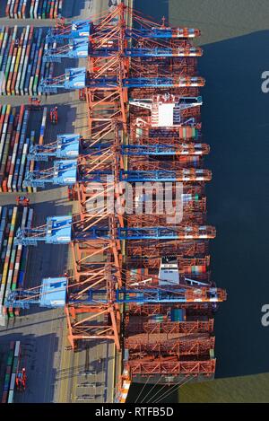Aerial view, container ship Al Dahna loading at Eurogate in the container port, Hamburg, Germany Stock Photo