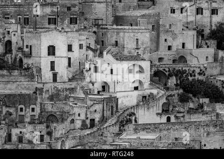 Amazing close-up black and white view of ancient town of Matera, the Sassi di Matera, Basilicata, Southern Italy, architectural details and buildings  Stock Photo