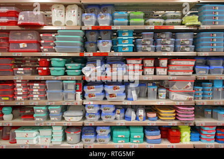 Stack of food tuppers plastic containers displayed on a supermarket Stock Photo
