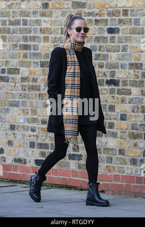 Caroline Flack walks near her London home wearing a burberry scarf and  aviator sunglasses Featuring: Caroline Flack Where: London, United Kingdom  When: 29 Jan 2019 Credit:  Stock Photo - Alamy