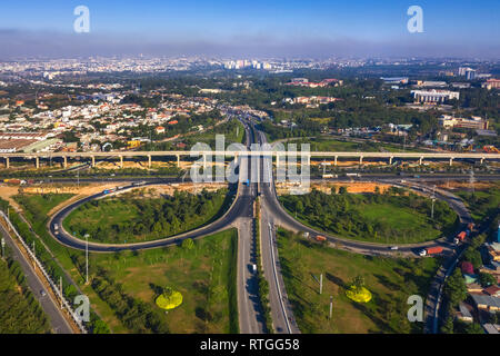 Top view aerial of ' Tram 2 ' overpass, intersection of 1A national road with Hanoi highway. Ho Chi Minh City, Vietnam. View from district 9 to ThuDuc Stock Photo