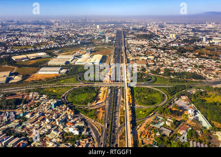 Top view aerial of ' Tram 2 ' overpass, intersection of 1A national road with Hanoi highway. Ho Chi Minh City, Vietnam. View from Dong Nai to 9 Stock Photo