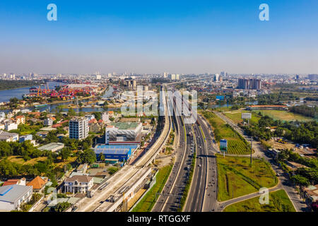 Top view aerial of Ha Noi highway view from district 2 to district 9, Ho Chi Minh City with development buildings, transportation, infrastructure, Vie Stock Photo