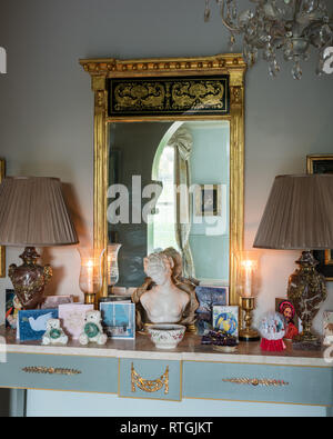 Christmas cards on marble topped console table made by Jeremy Nieboet Stock Photo