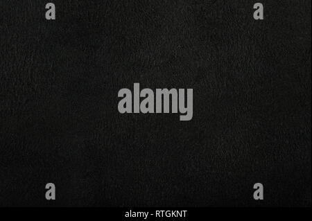 Black canvas background. Dark cotton surface texture Stock Photo