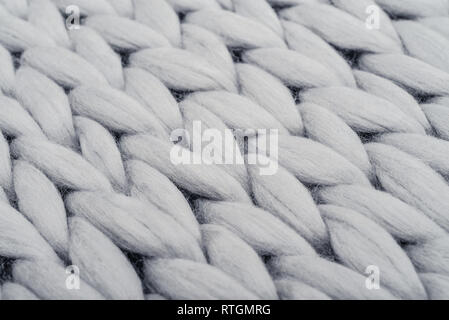 wooden knitting needles on background of grey merino wool blanket Stock  Photo - Alamy