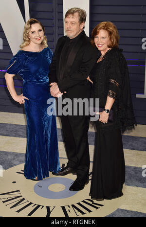 BEVERLY HILLS, CA - FEBRUARY 24: (L-R) Chelsea Hamill, Mark Hamill and Marilou York attend the 2019 Vanity Fair Oscar Party hosted by Radhika Jones at Stock Photo