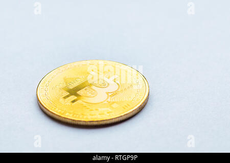 Golden bitcoin on white background. Concept mining. Copyspace Stock Photo