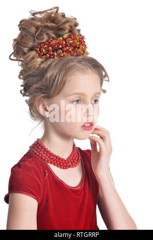 Portrait of cute girl in red dress posing isolated Stock Photo
