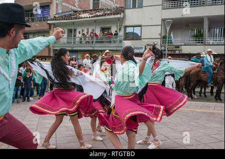 Donmatias, Antioquia, Colombia: Cabalgata and traditional dance, Parque Principal. Stock Photo