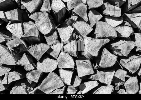 Stacked firewood during winter time for household use in Lower Austria Stock Photo