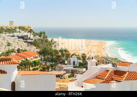 White houses nad resorts by wide sandy beaches in Morro Jable, Jandia Peninsula, Fuerteventura, Spain Stock Photo