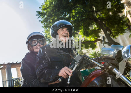 couple of elderly motorcyclists Stock Photo