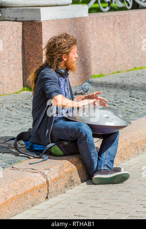 Street musician playing on hang, Saint Petersburg, Russia Stock Photo