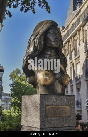 Paris, France - May 8, 2018: Brass bust of teh famous French singer Dalida in Montmartre district in Paris. Stock Photo
