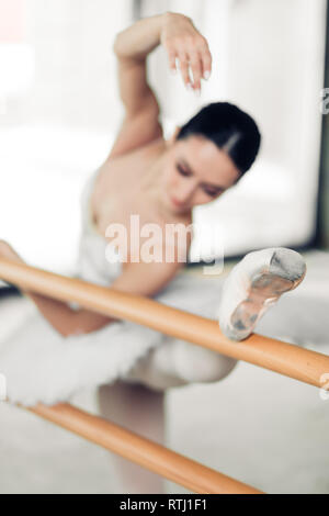athletic and flexible woman attending ballet classes. close up photo. Stock Photo