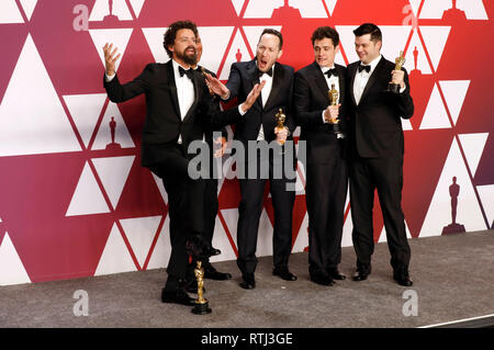 Bob Persichetti, Peter Ramsey, Rodney Rothman, Phil Lord and Christopher Miller, winners of Best Animated Feature Film for 'Spider-Man: Into the Spider-Verse', pose in the press room at the 91st Annual Academy Awards at Hollywood and Highland Center on February 24, 2019 in Hollywood, California. Stock Photo