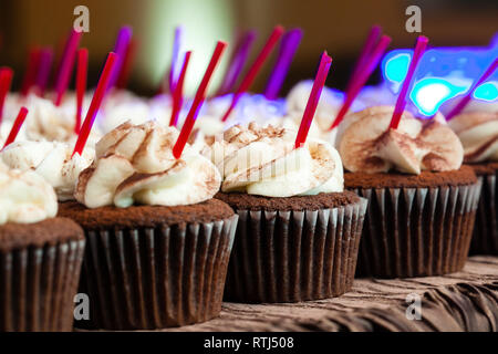 chocolate wedding cupcakes with frosting during a catered event Stock Photo