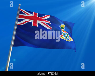 Cayman Islands National Flag Waving on pole against deep blue sky background. High Definition Stock Photo