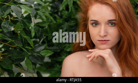 Beautiful young redhead woman doubt expression, confuse and wonder ...