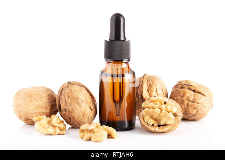 Walnut oil isolated on white background. walnut oil for Cosmetic or beauty care Stock Photo