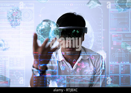 Business Men steps into virtual reality world with microsoft hololens 1 Stock Photo