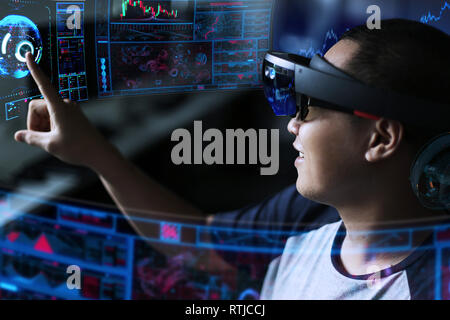 Business Men steps into virtual reality world with microsoft hololens 1 Stock Photo